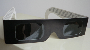 A pair of solar eclipse glasses